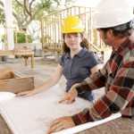 a construction apprentice with a qualified builder