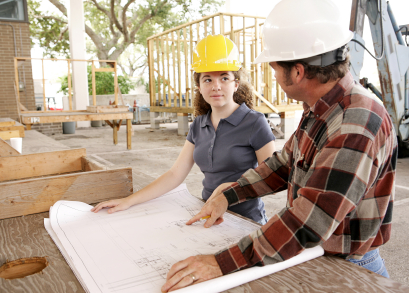 a construction apprentice with a qualified builder